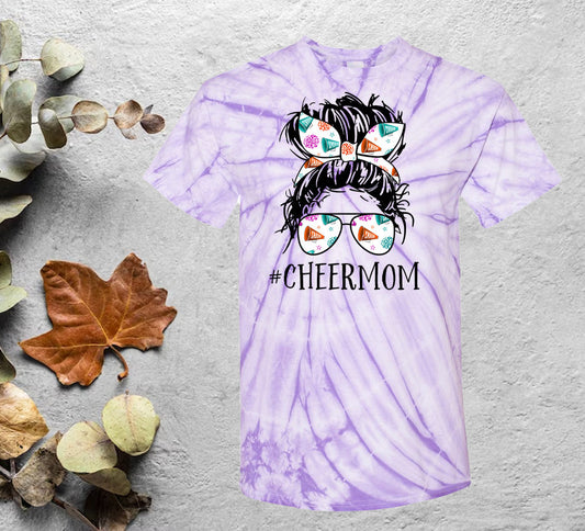 Purple tie dye cheer mom graphic tee with messy bun and bow design